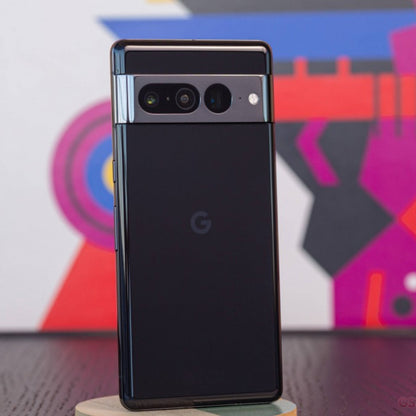 Black smartphone with Google logo on a colorful abstract background