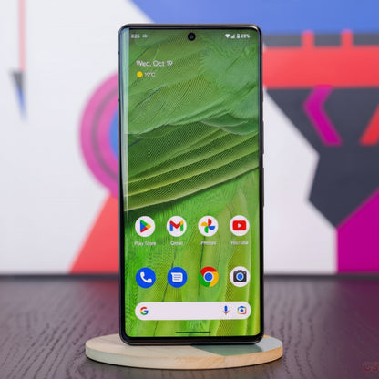 Smartphone with app icons on a colorful abstract background